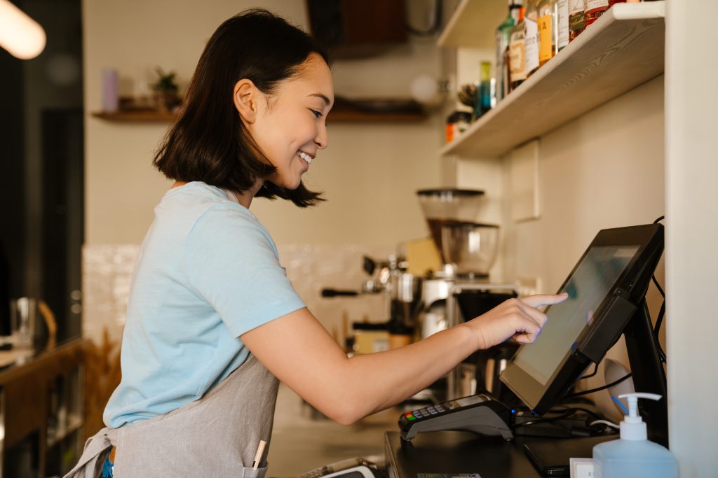 A service staff satisfied with the F&B POS System