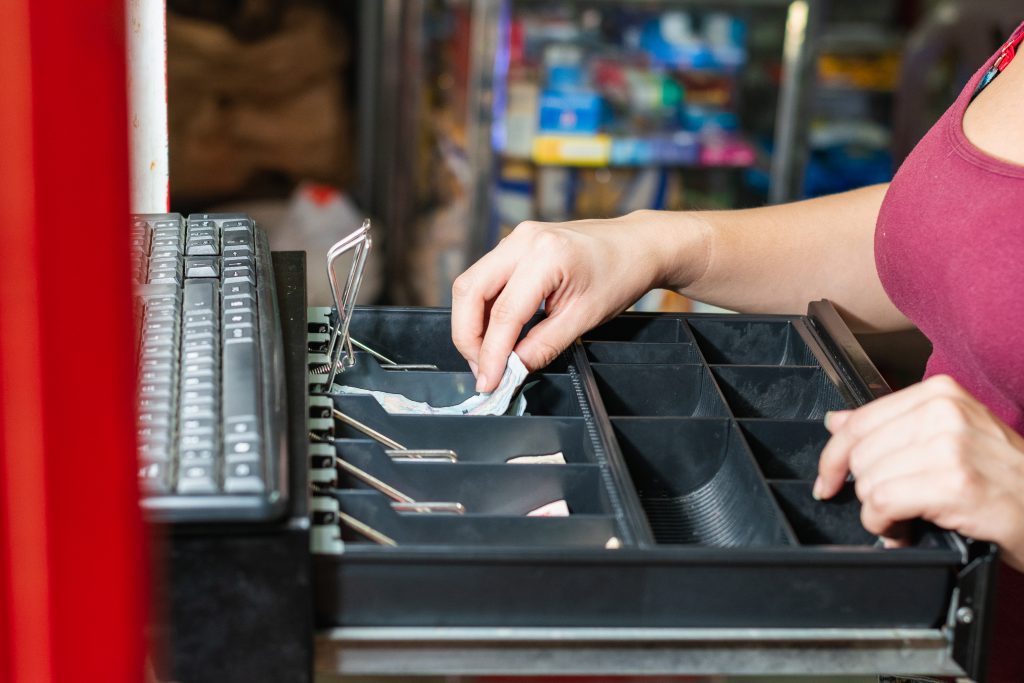 an old school POS machine in use
