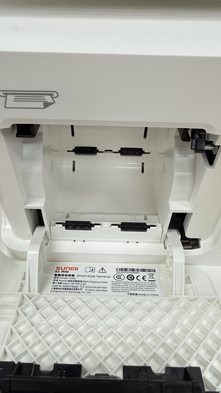 Removing the printer plates for 80 mm receipt rolls