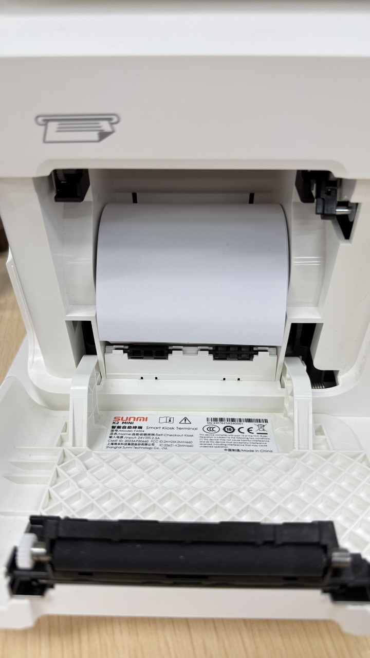 Removing the printer plates for 80 mm receipt rolls
