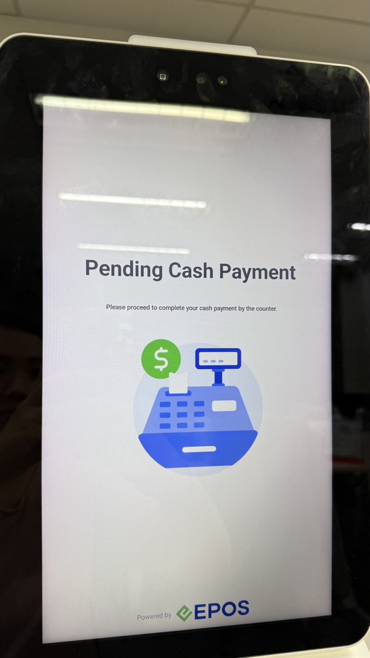 Kiosk while the cashier collects the cash